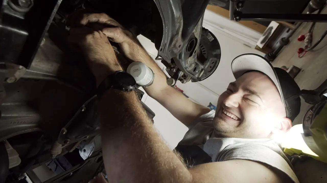 Martin underneath a Toyota Yaris