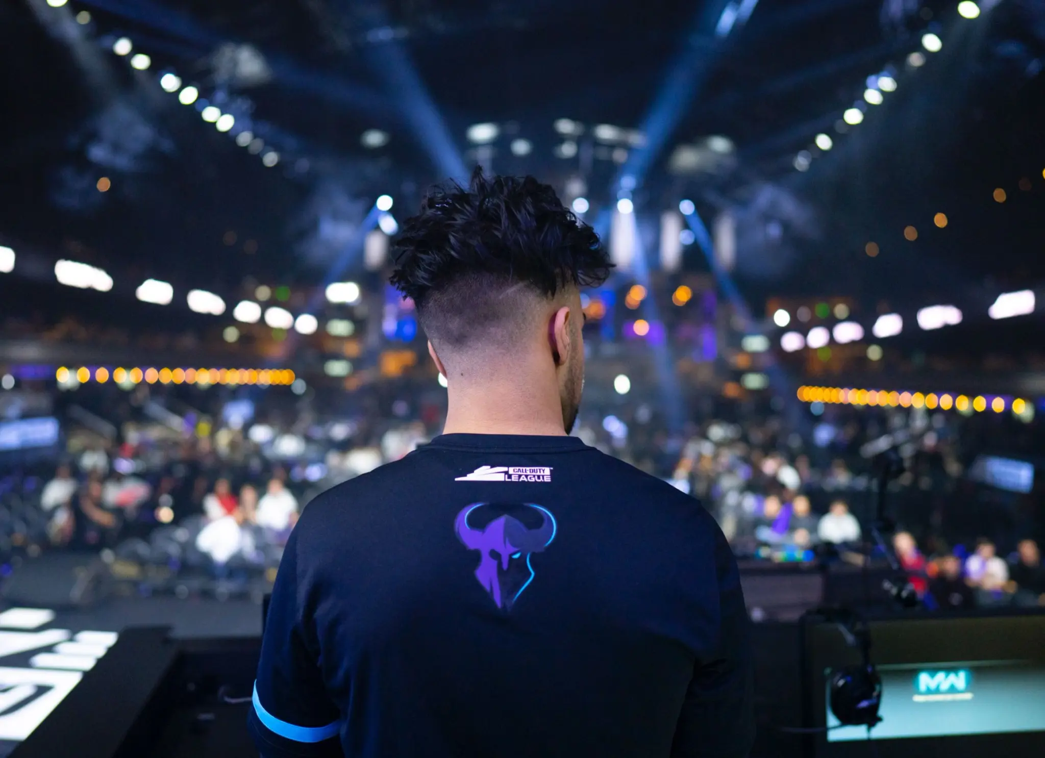 Minnesota home player standing in front of the crowd.