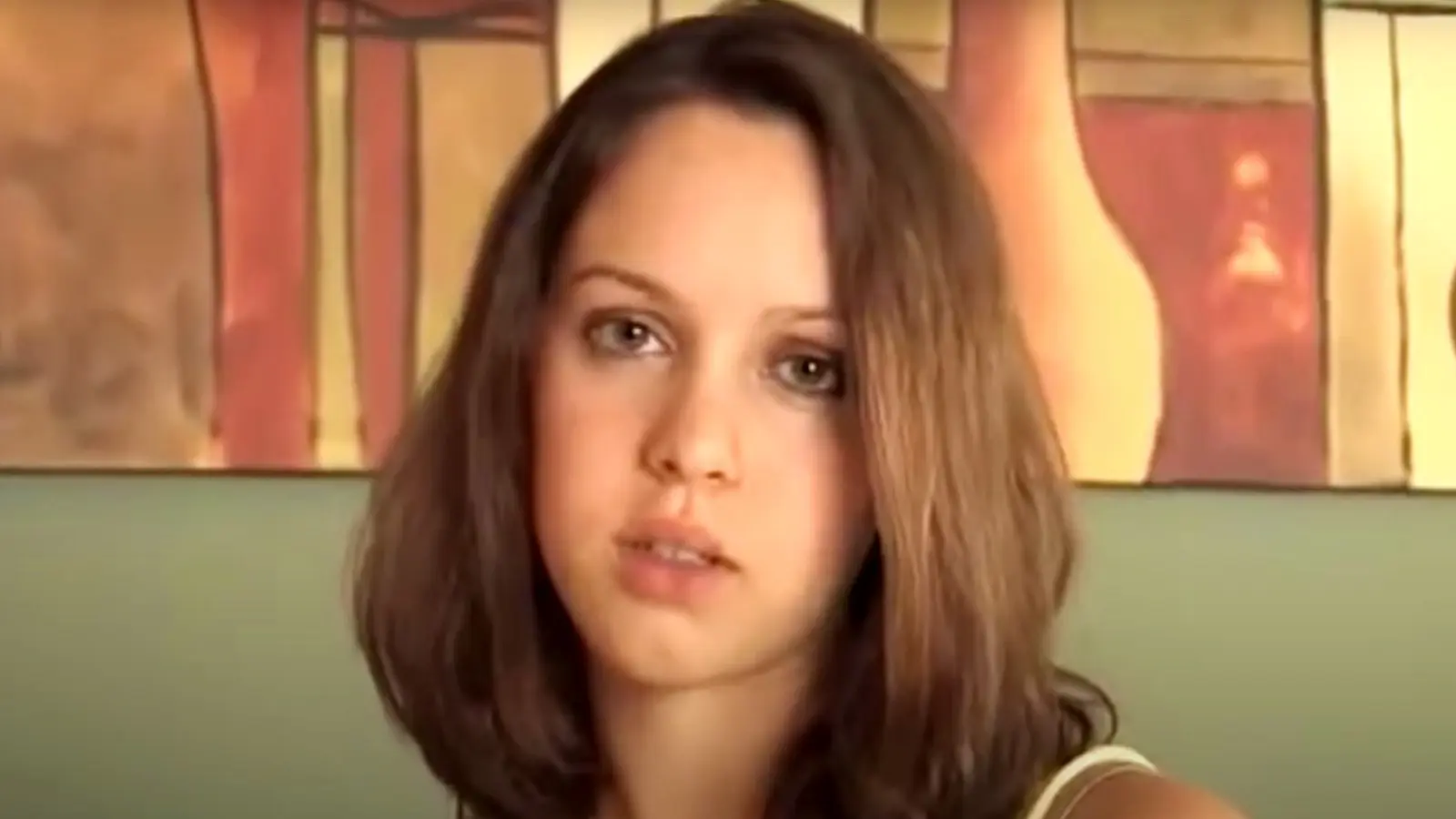 Screenshot of Megan from the film Megan is Missing staring at the camera