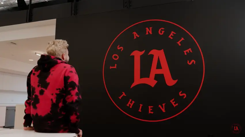 Nadeshot next to the Los Angeles Thieves logo