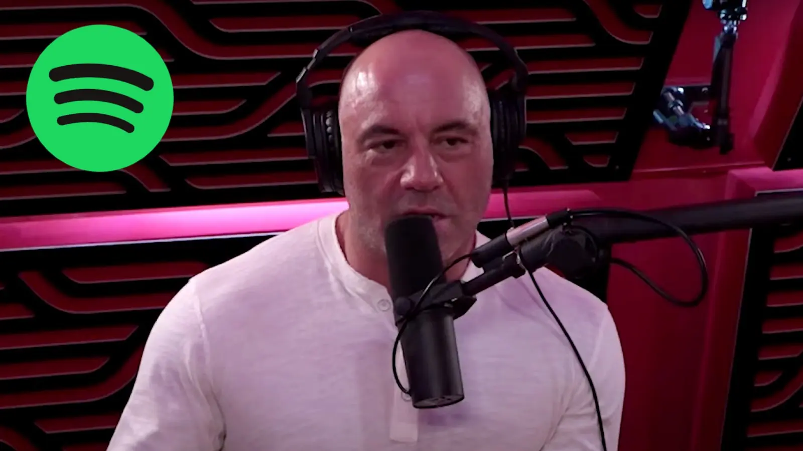 Joe Rogan on the JRE podcast next to the Spotify logo