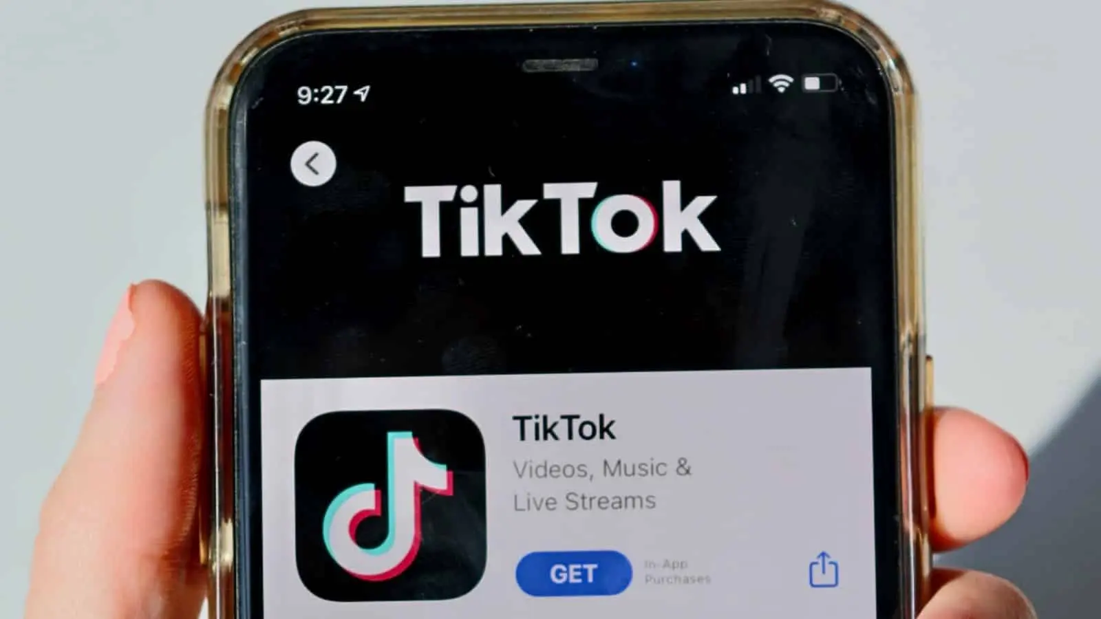 TikTok logo on a phone screen