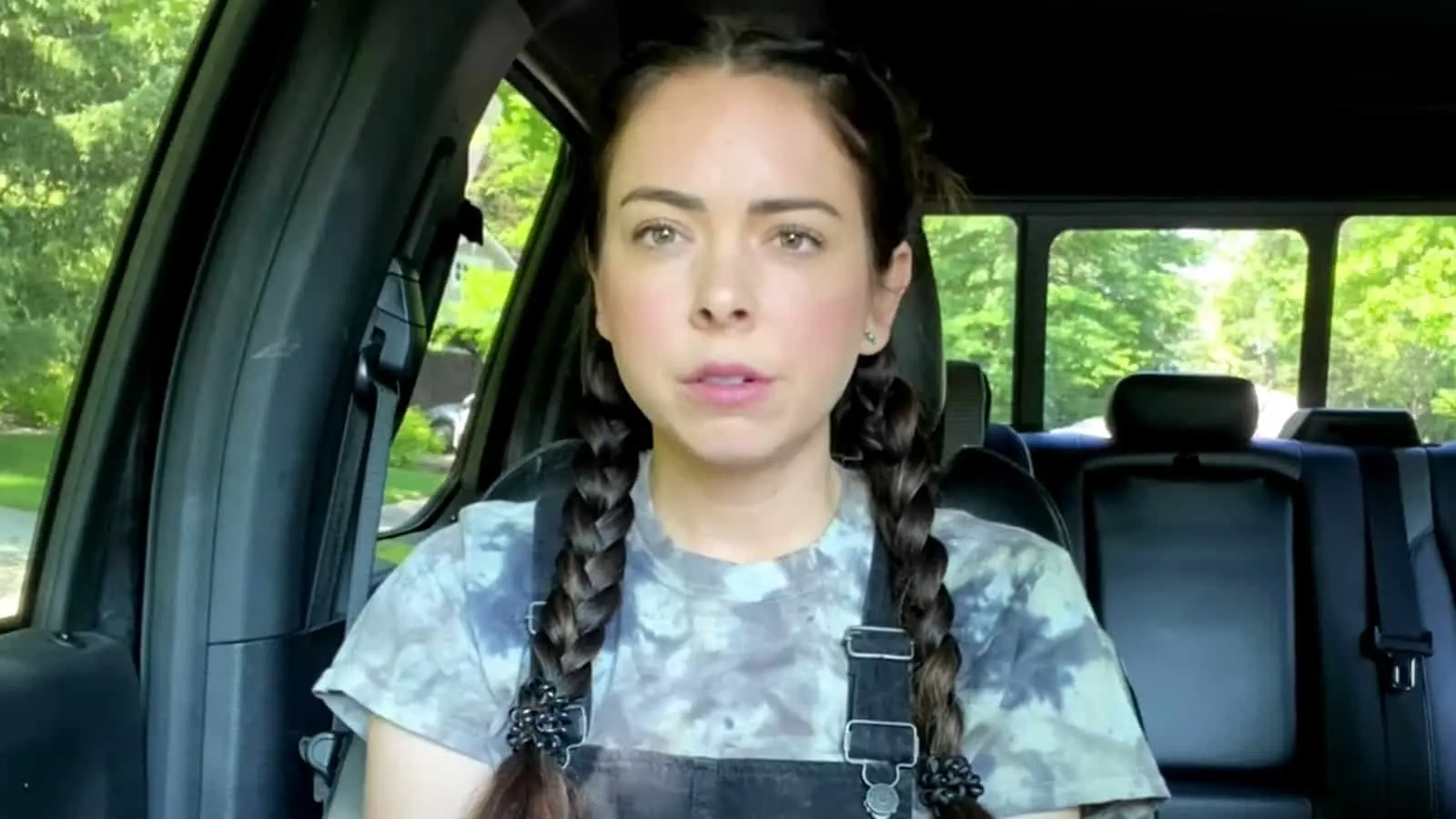 Nikki Phillippi sits in her car