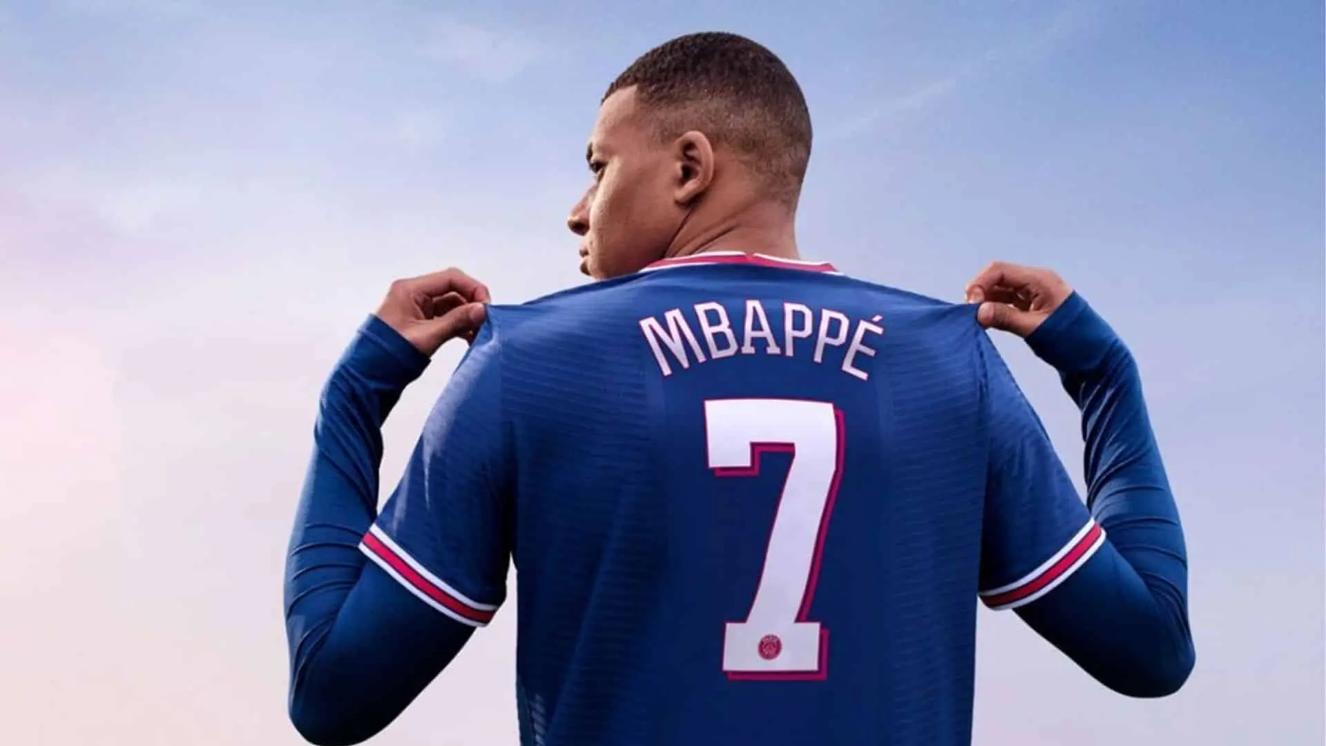 Kylian Mbappe holding PSG shirt in FIFA 22