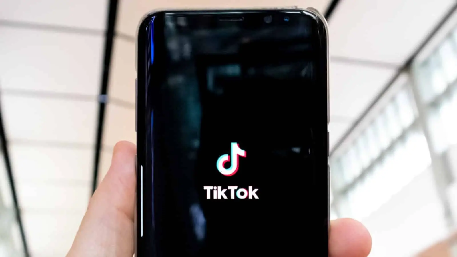 TikTok logo on a phone