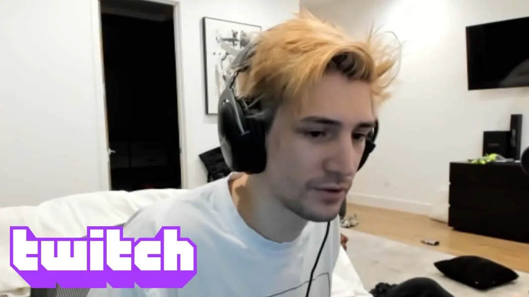 xQc on stream with Twitch logo