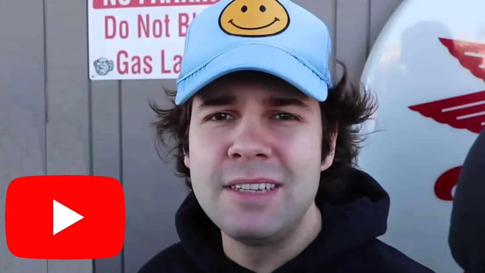 David Dobrik with YouTube logo in bottom left corner