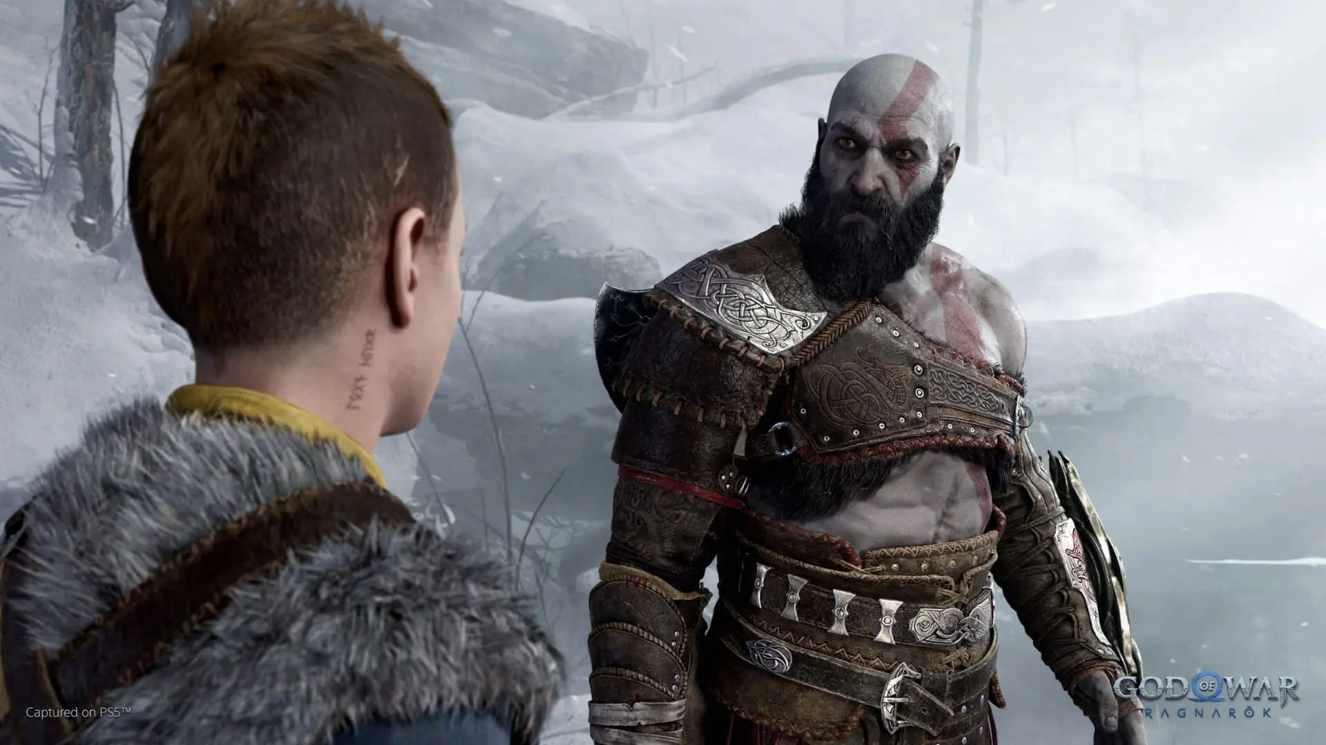 kratos and atreus looking at each other in god of war ragnarok