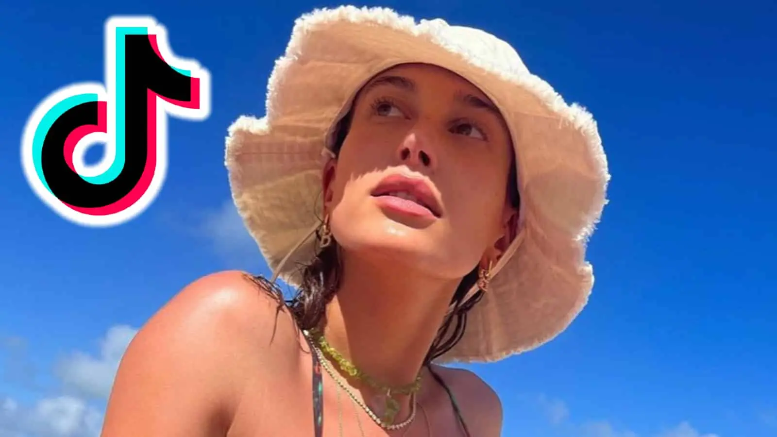 Hailey Bieber in front of the sky