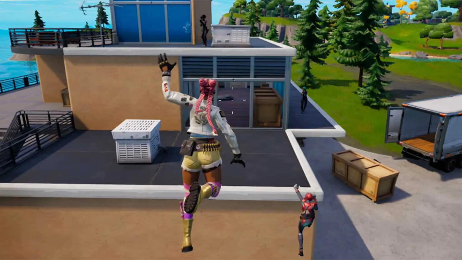 A Fortnite player mantling onto a ledge