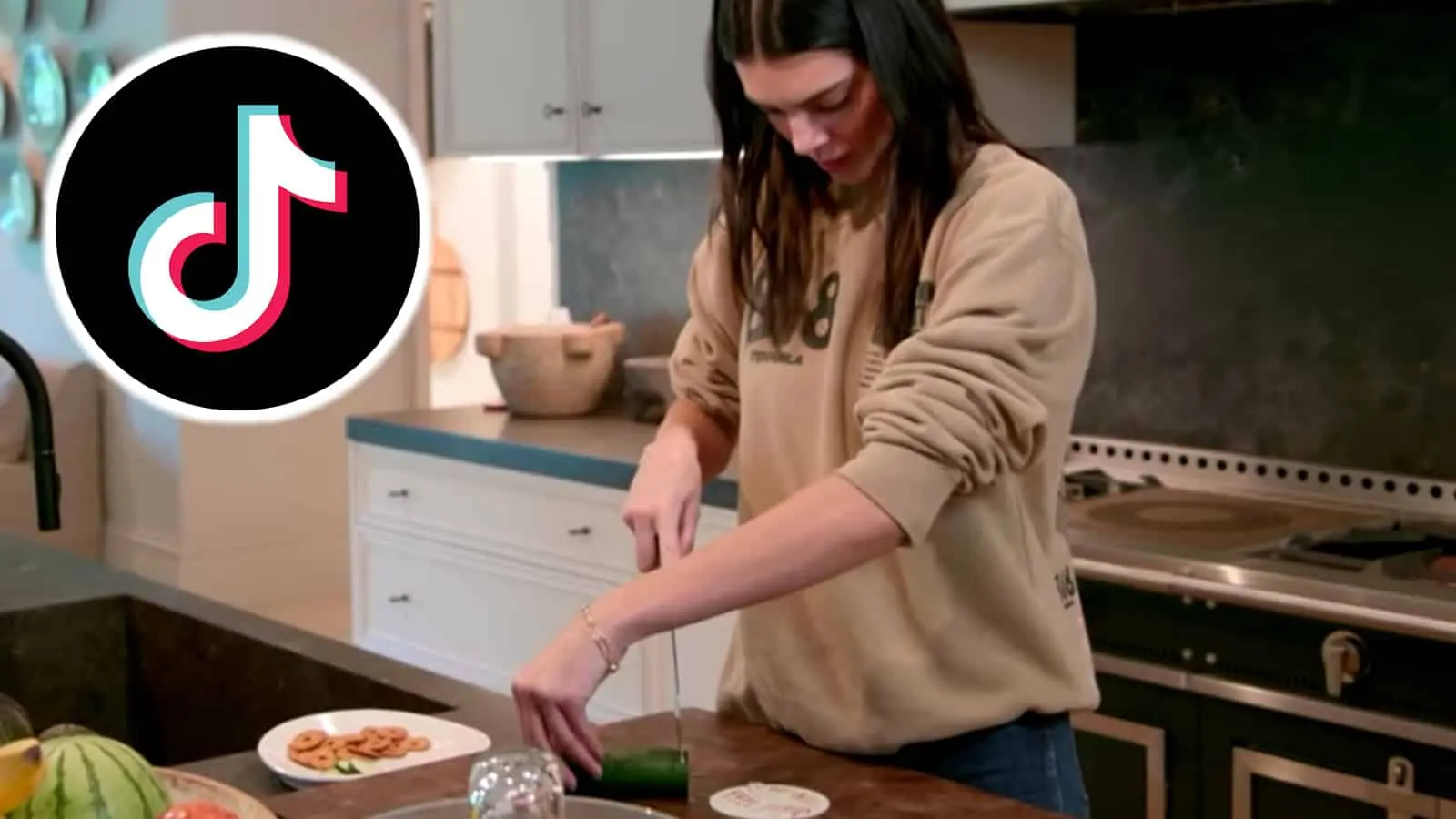 Kendall Jenner cuts a cucumber