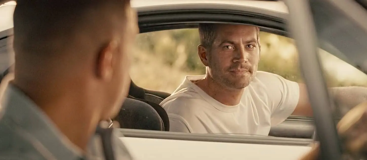 Paul Walker looking at Vin Diesel at the ending of Furious 7.