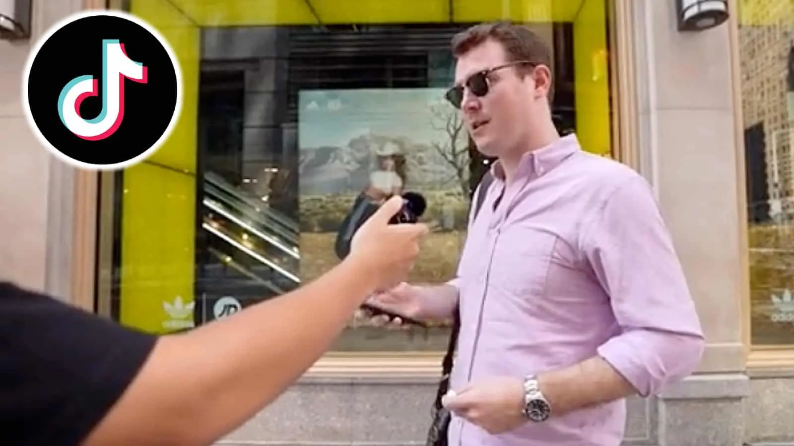 Man being interviewed on the street