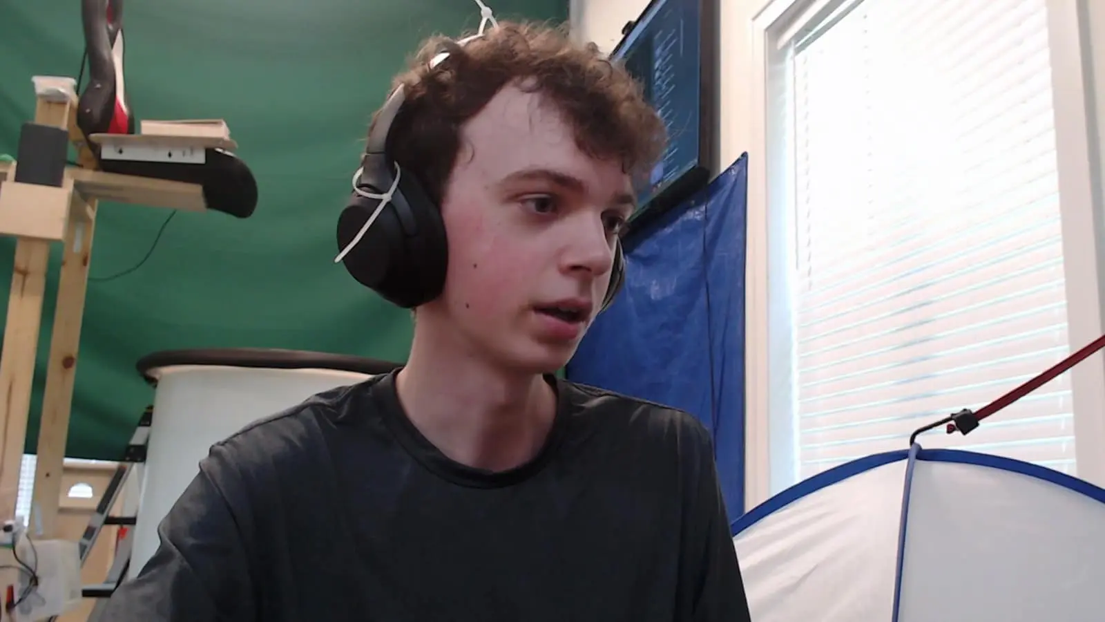 KeatDawg sitting in front of his dunk tank