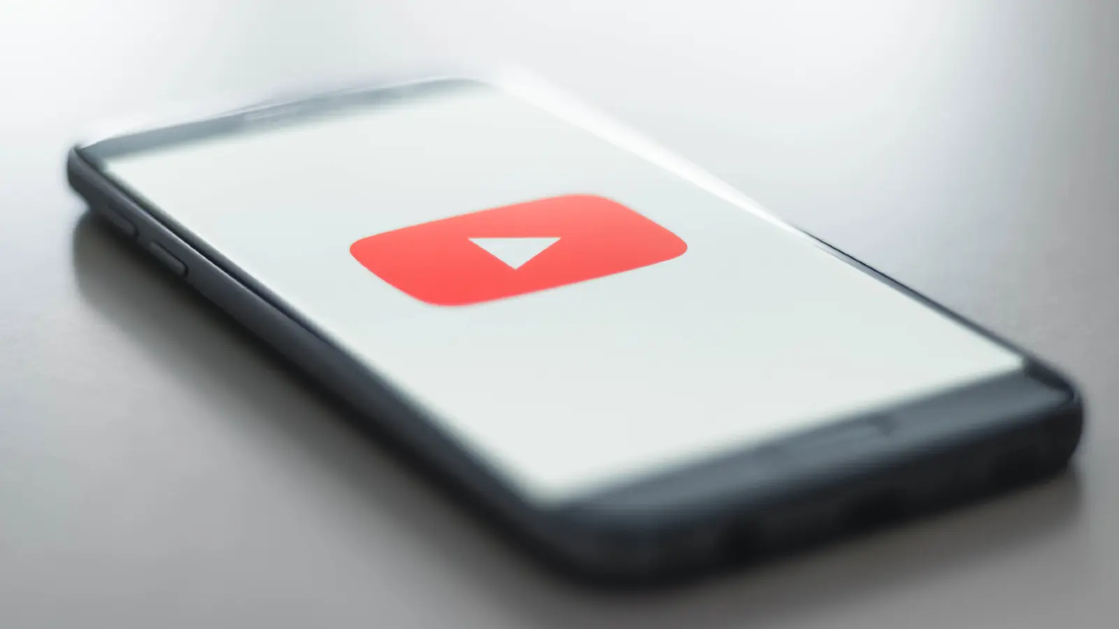 YouTube logo on a phone