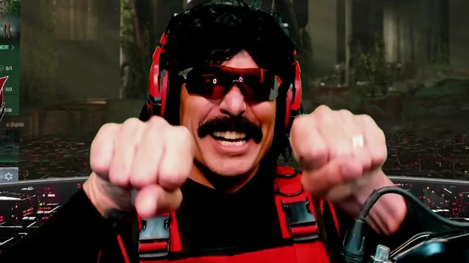 Dr Disrespect on stream giving the knuckles to chat.