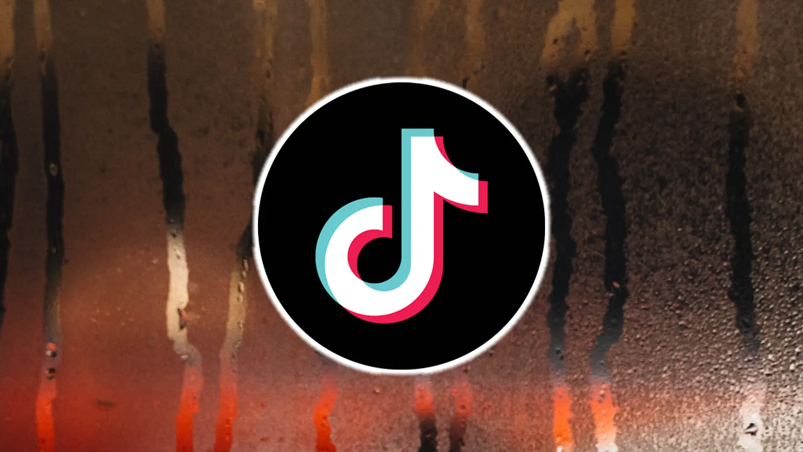 Condensation on a window with the TikTok logo