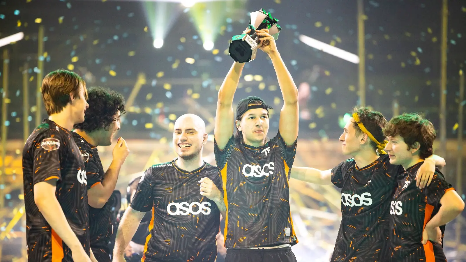 Fnatic lifting the VCT LOCK//IN trophy.