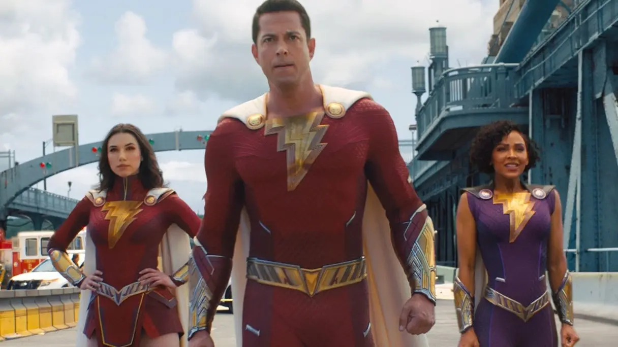 Zachary Levi on a bridge with his superhero pals in Shazam 2.