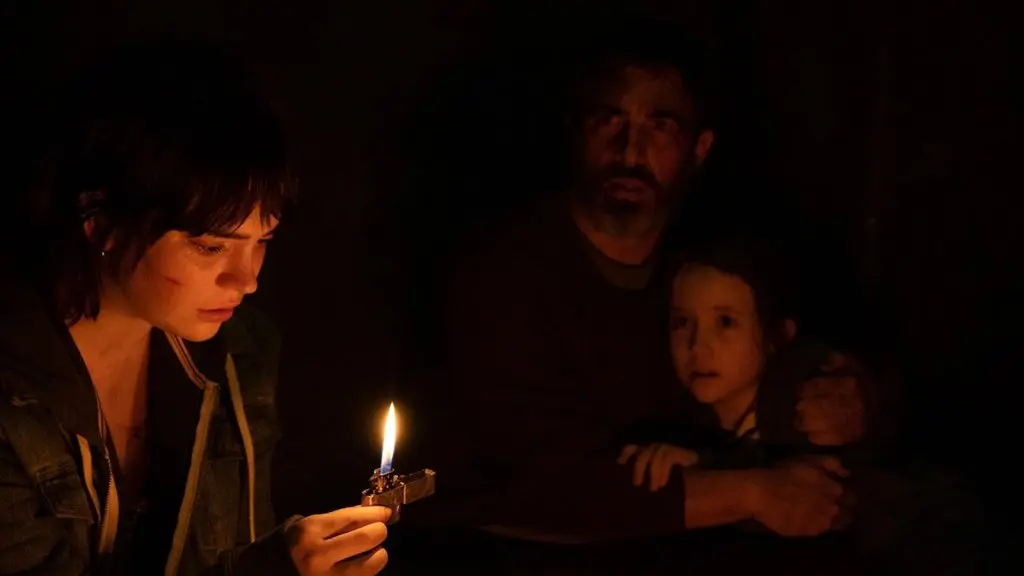 Sophie Thatcher as Sadie, Vivien Lyra Blair as Sawyer, and Chris Messina as Will in The Boogeyman