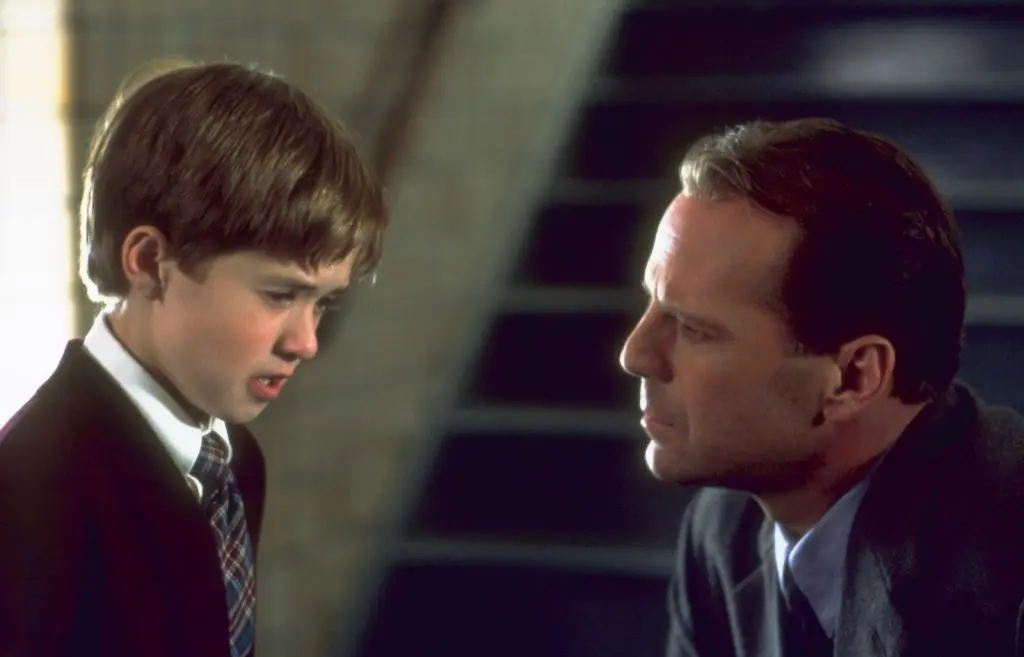 Haley Joel Osment and Bruce Willis in The Sixth Sense