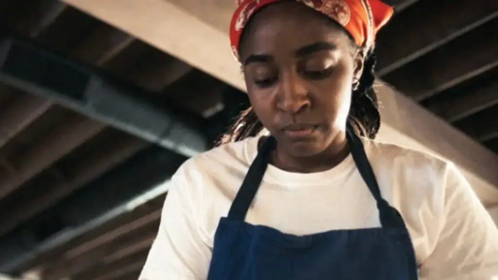 A close up of Syd cooking in The Bear