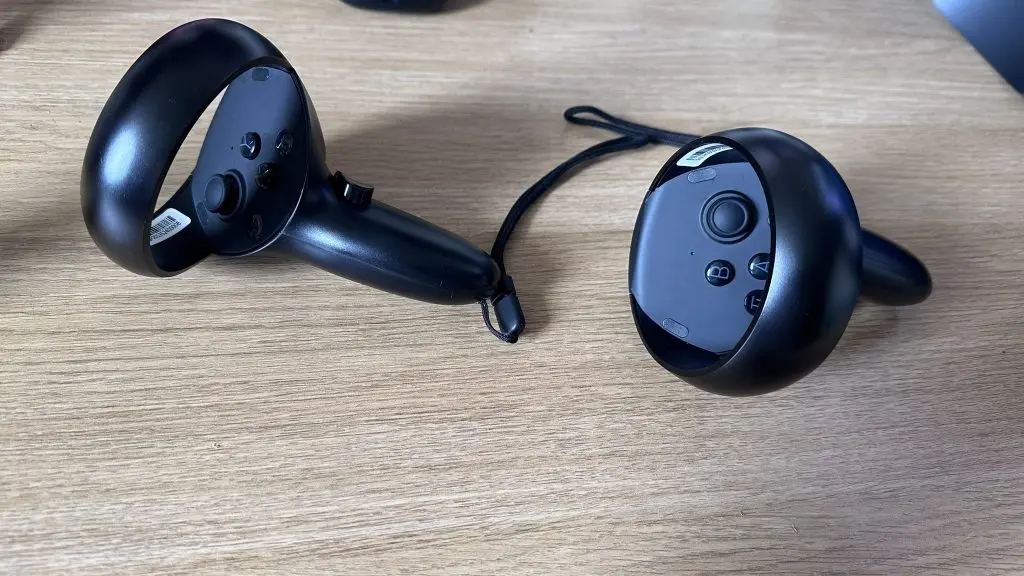 Pimax Crystal controllers on a desk