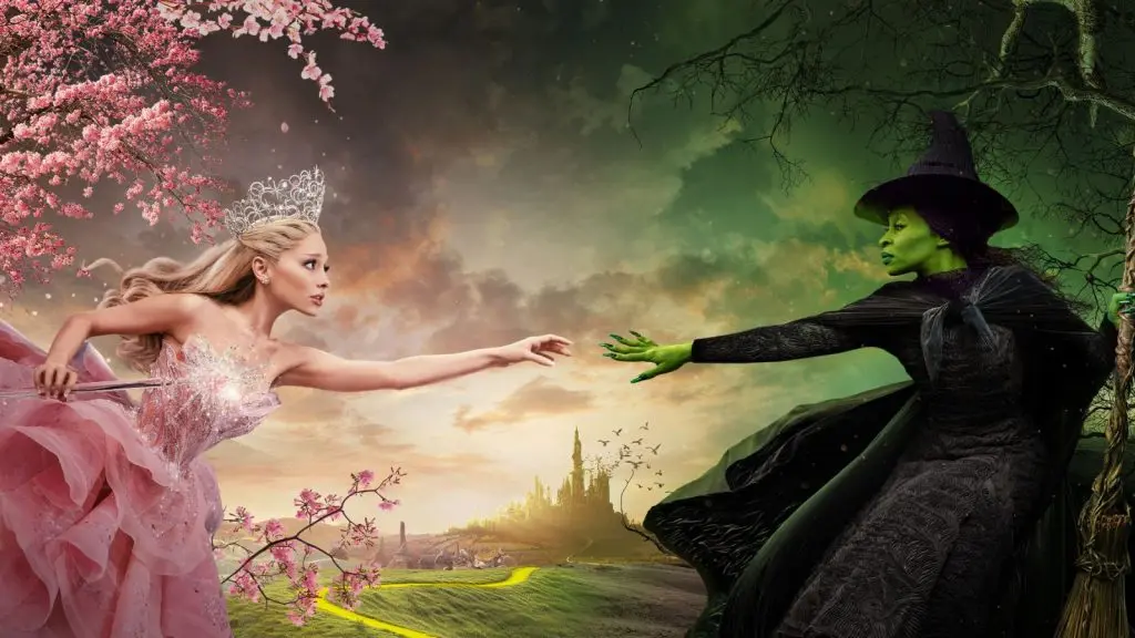 Glinda and Elphaba reach out to each other in Wicked promo