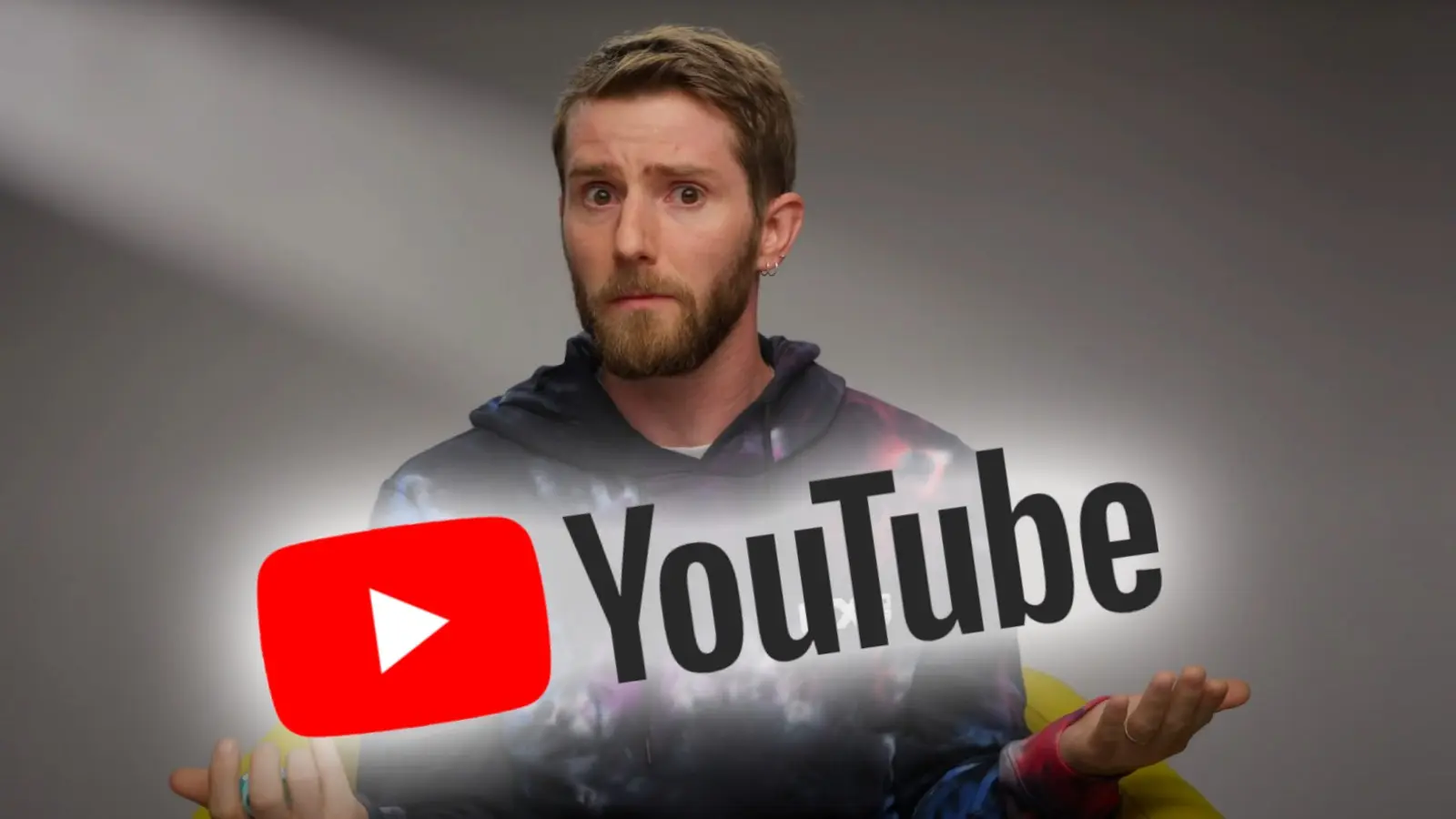 Linus Sebastian on a grey background with a YOutube logo