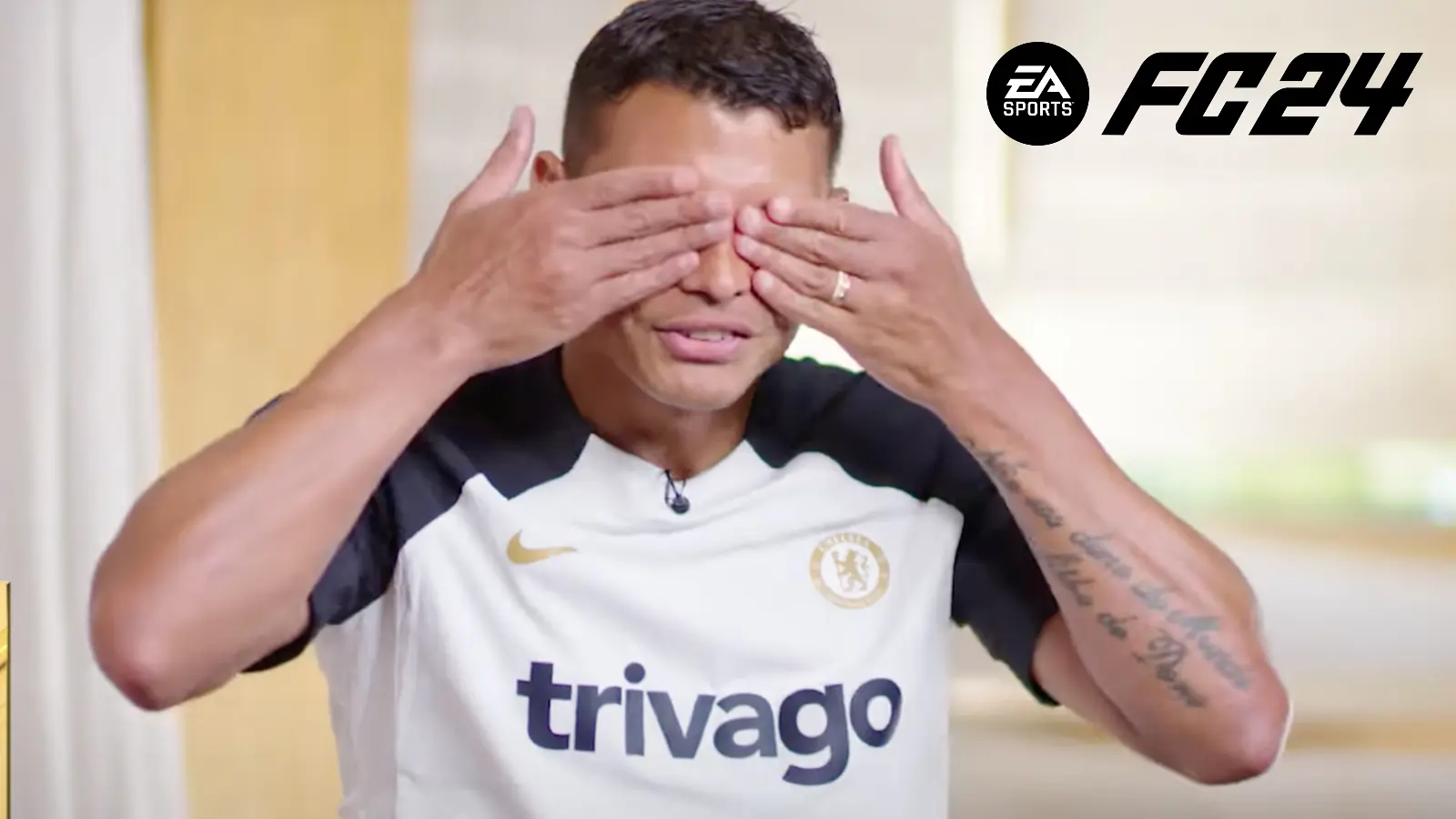 Thiago Silva covering eyes with EA FC 24 logo in top right corner