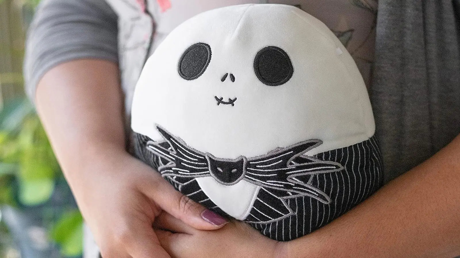 Jack Skellington Squishmallow being held