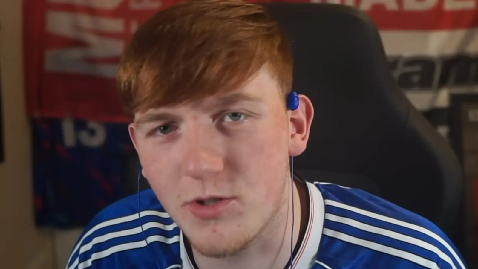 AngryGinge13 wearing blue football top