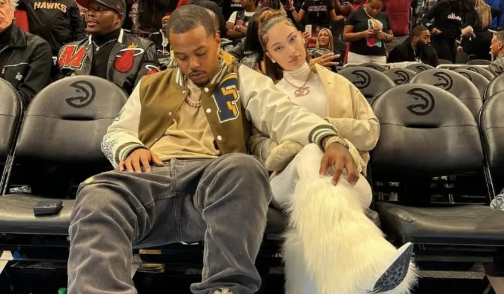 Bhad Bhabie and boyfriend Le Vaughn sitting at a sports game