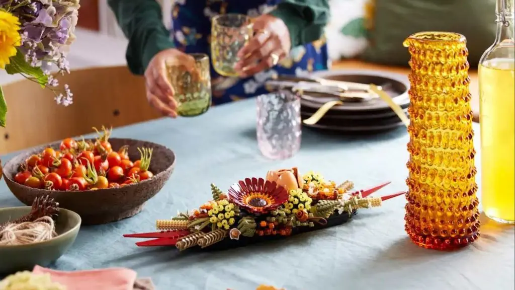 The LEGO Icons Dried Flower Centerpiece displayed on a dining table.