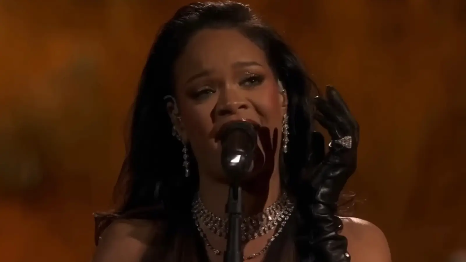 Rihanna performing onstage during an awards show