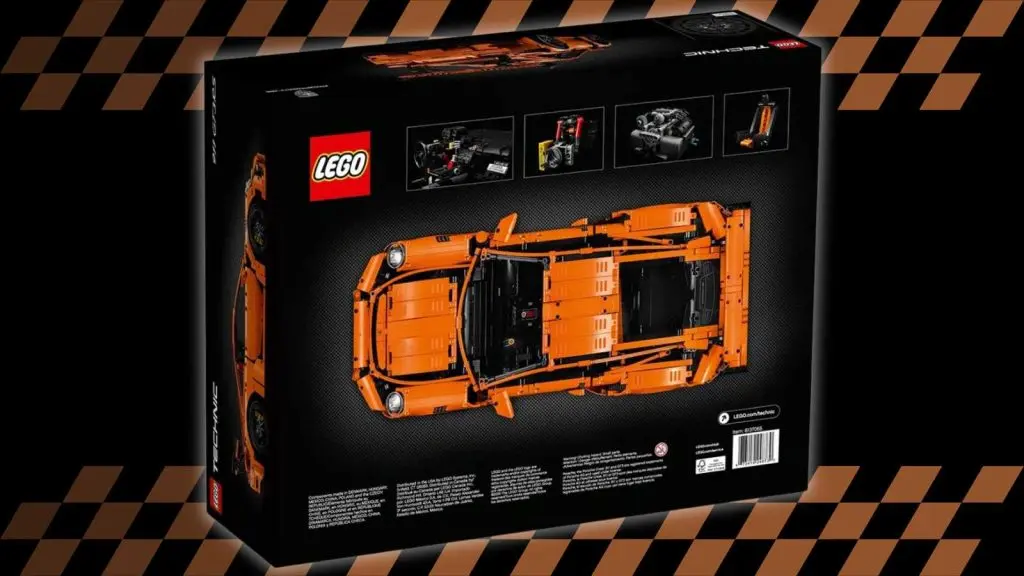 The LEGO Technic Porsche 911 GT3 RS on a black background with orange racing stripes