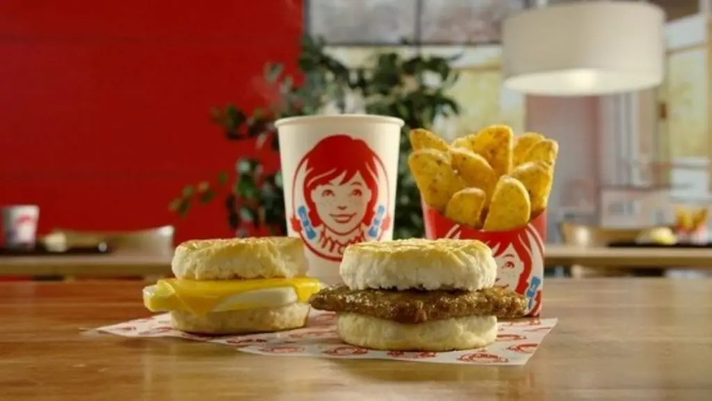 Wendy's breakfast with biscuits, drinks and potatoes