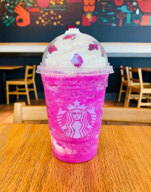 A pink starbucks frappuccino