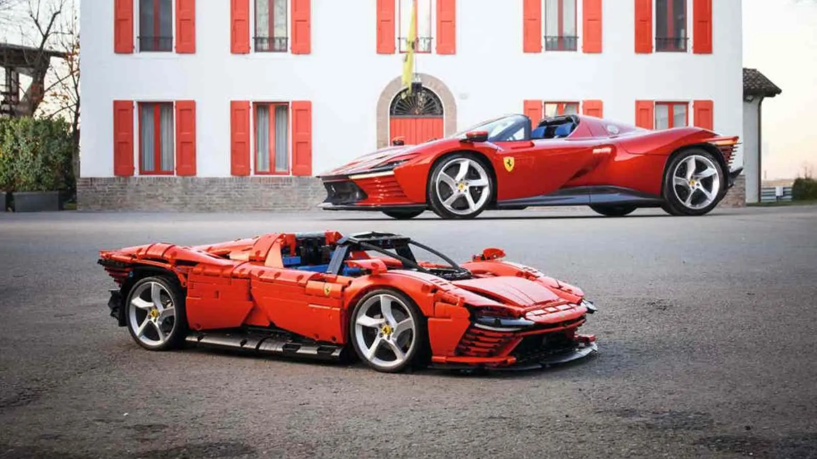 The LEGO Ferrari Daytona SP3 in front of the real Daytona SP3