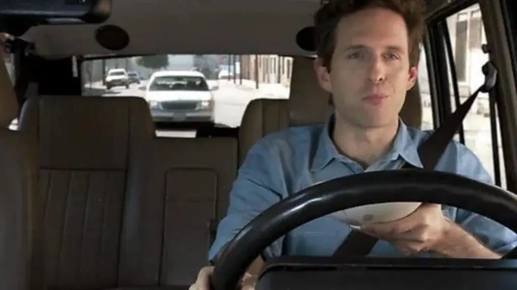 Dennis Reynolds eats cereal in his car