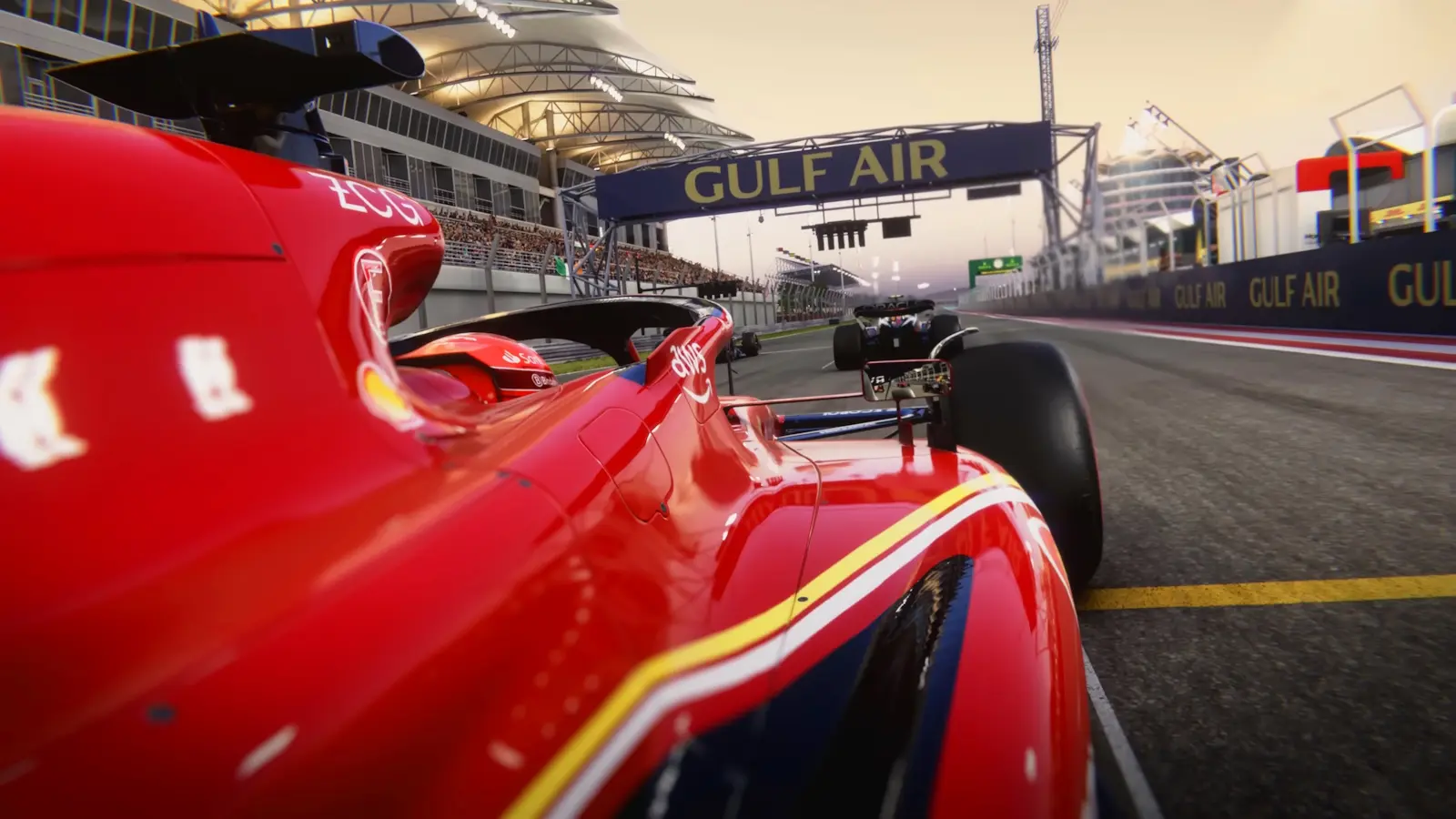 F1 24 red Formula 1 car on starting grid.