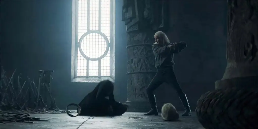 House of the Dragon: Daemon Targaryen (Matt Smith) swings his sword as Rhaenyra's head falls to the ground