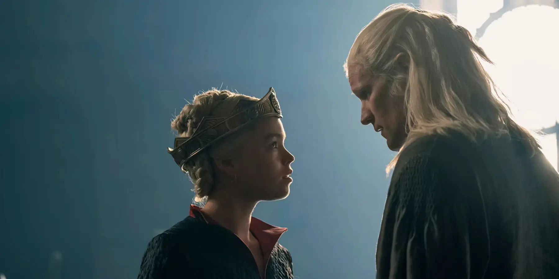 Matt Smith and Milly Alcock as Daemon and Rhaenyra in House of the Dragon, looking at each other in Harrenhal