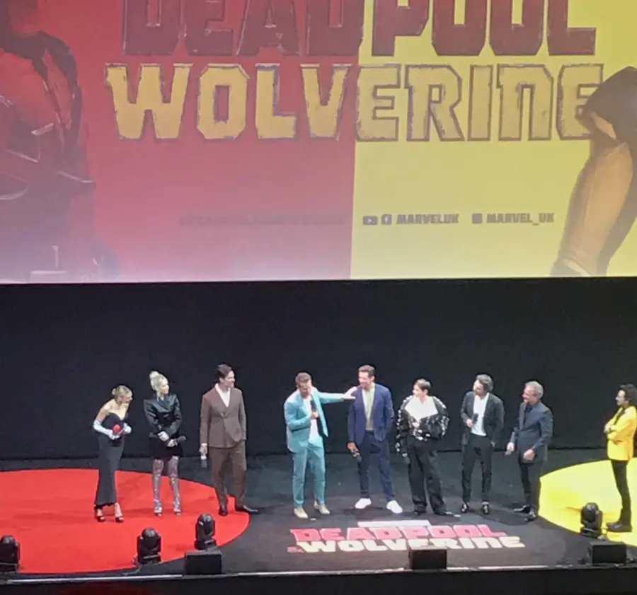 Ryan Reynolds and Hugh Jackman on stage at the Deadpool & Wolverine sneak peak event