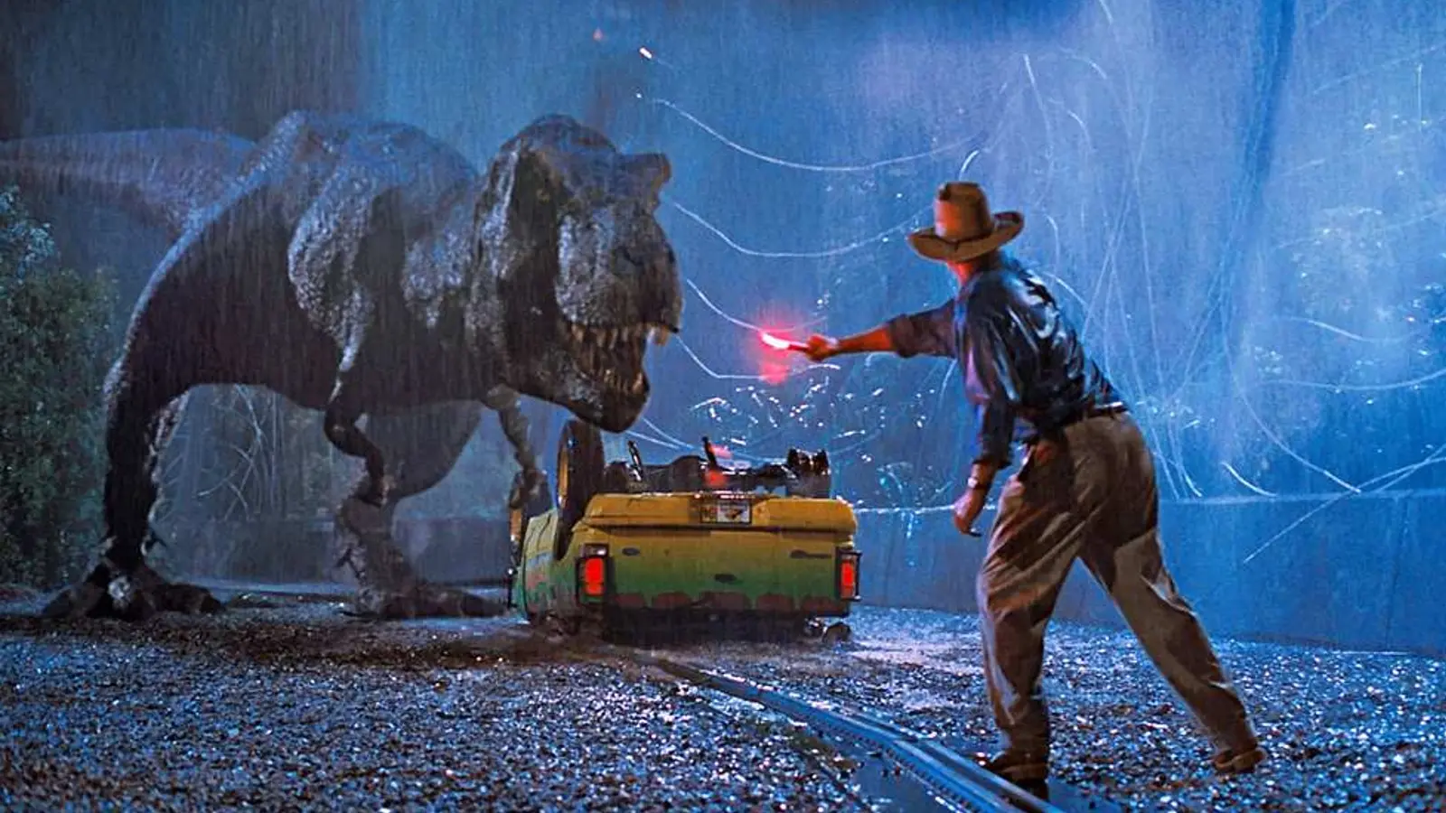 Sam Neill tries to attract a T-Rex in Jurassic Park.