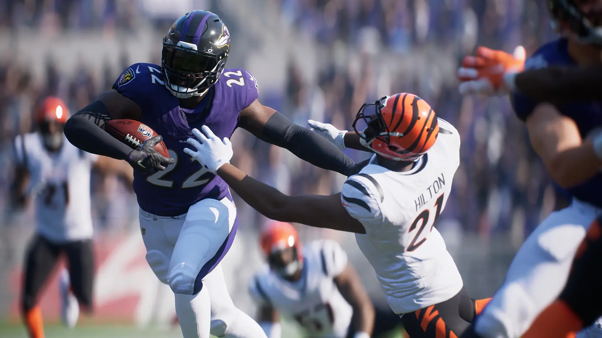 An image of Madden 25 gameplay with a defender trying to stop a offensive player.