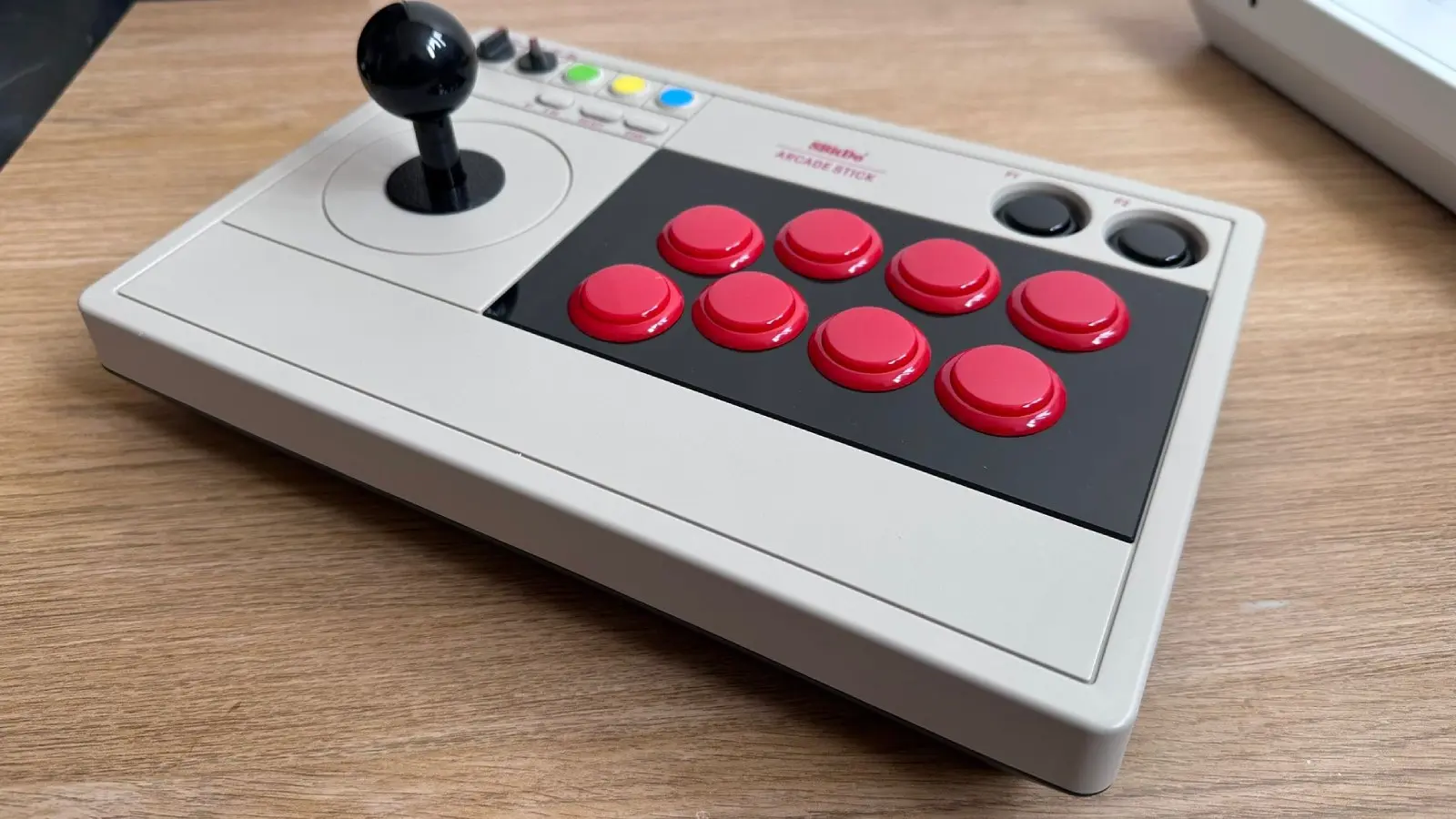 8BitDo Arcade stick for Switch on a table