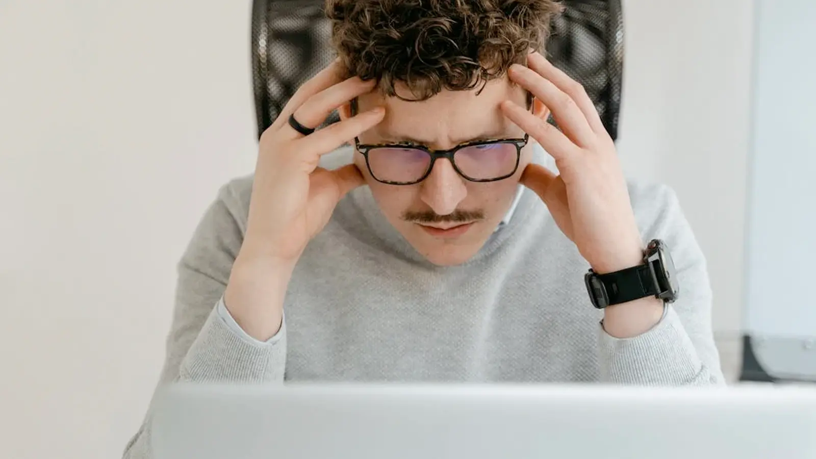 man looking confused at pc