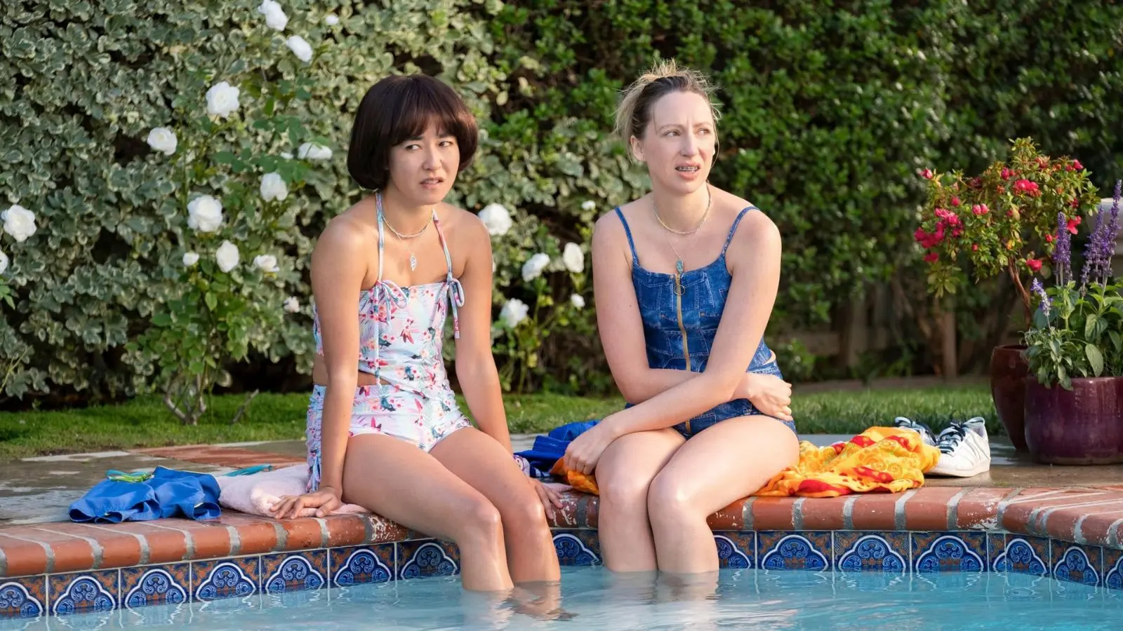 Maya and Anna during the pool scene in PEN15