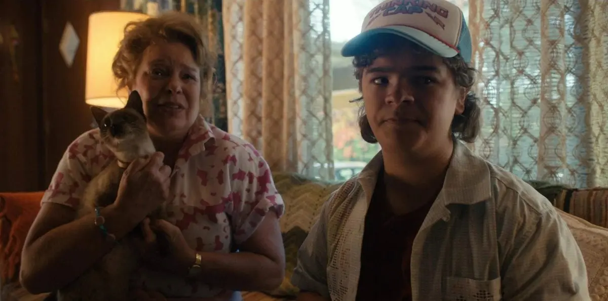 Gaten Matarazzo as Dustin and Catherine Curtin as his mom in Stranger Things